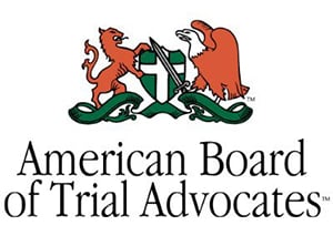 American Board of Trial Advocates logo with dragon and eagle with shield in between